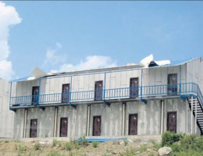 This incomplete dorm building of University of St. Eustatius School of Medicine at Lampeweg is already in a serious state of disrepair. (Photo The Daily herald)