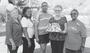 From left: Mother’s Day Bazaar cake contest judge Winny Hassell with winners Shareska Lucas, Christina Hassell and Peggy Barnes, and judge Yvonne Smith.