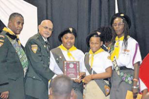 From left: Youth and Chaplaincy Ministries Director NCC Vincent David, Pastor Clive Dottin, Genesis Pathfinder Club Director Tessa Alexander, pathfinder Zakiya Lake and area coordinator  St. Eustatius/Saba Rosabelle Blake receiving an award at the induction ceremony.