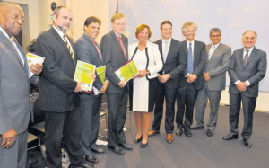 Representatives of the Caribbean Netherlands and the Dutch Government with the members of the Evaluation Committee at the presentation in The Hague on Monday. From left: Commissioners Reginald Zaandam (St. Eustatius), Chris Johnson (Saba), Clark Abraham (Bonaire), Secretary General of the Ministry of Home Affairs and Kingdom Relations Richard van Zwol, Committee Chairperson Liesbeth Spies, and Committee Members Frans Weekers, Luc Verhey, Glenn Thodé and Fred Soons. (Suzanne Koelega photo)