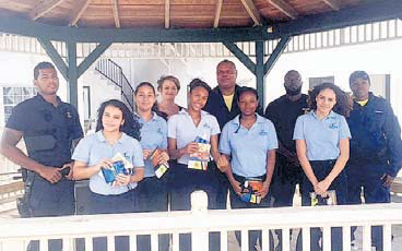 Coast Guard members visiting students at Saba Comprehensive School.